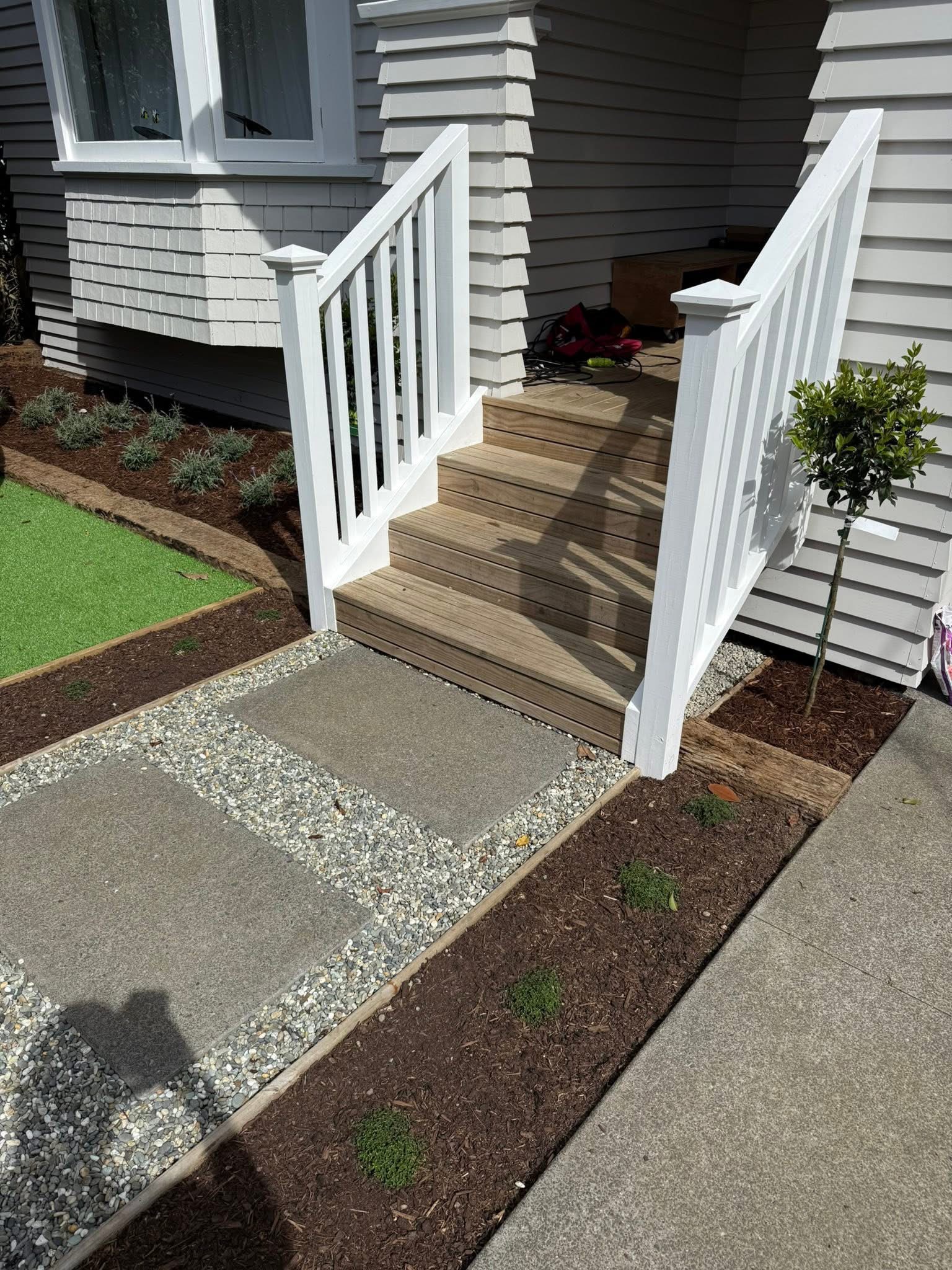 Front entrance landscaping with timber steps and paving — Element Landscaping Waikato