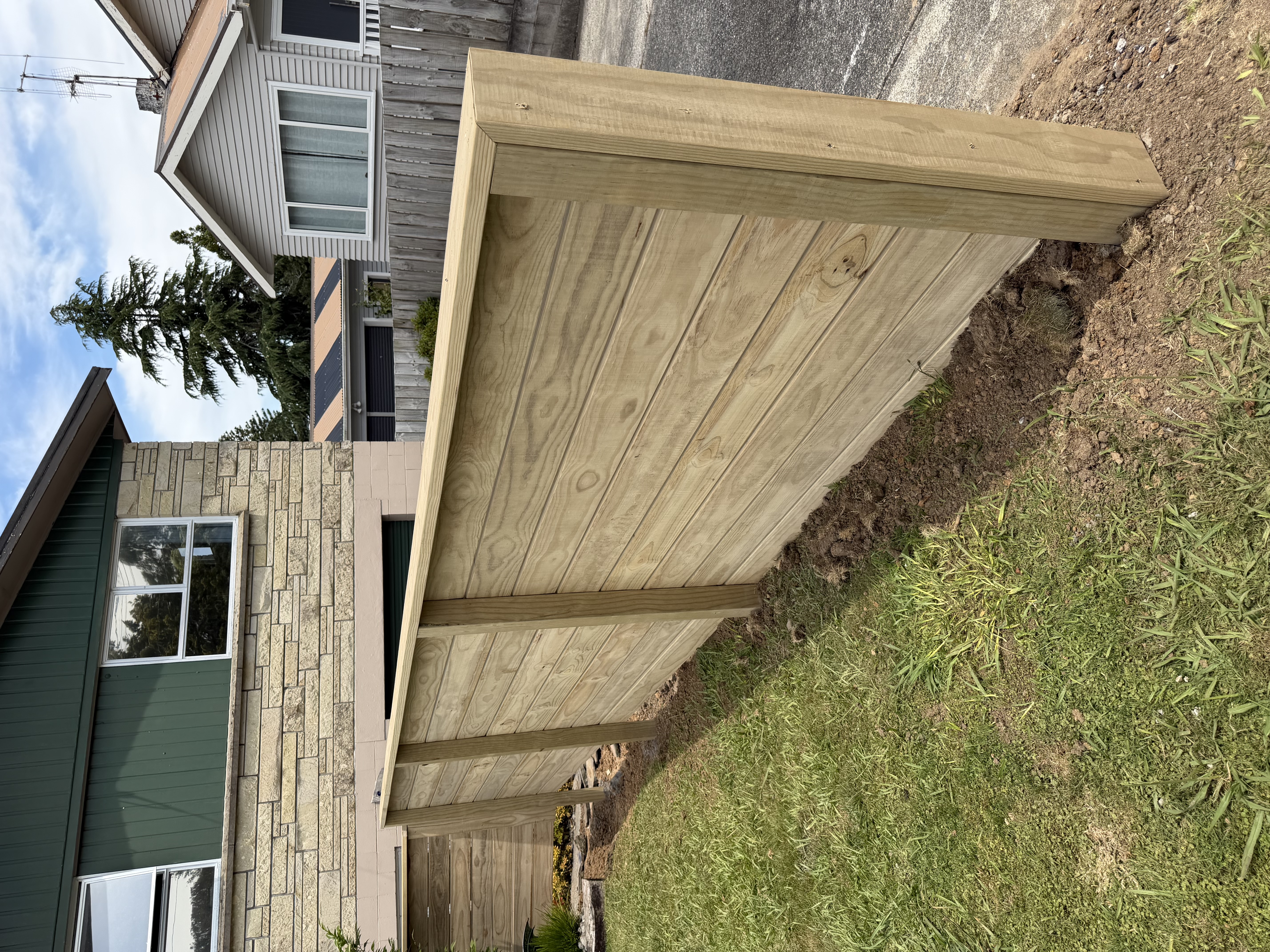 Horizontal timber boundary fence installation — Element Landscaping Waikato